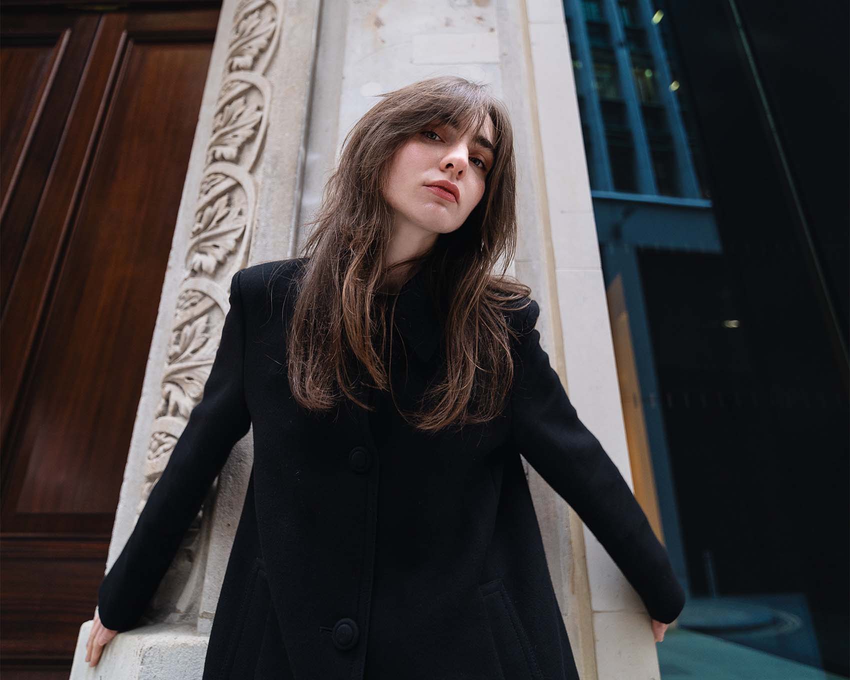 girl in black blazer