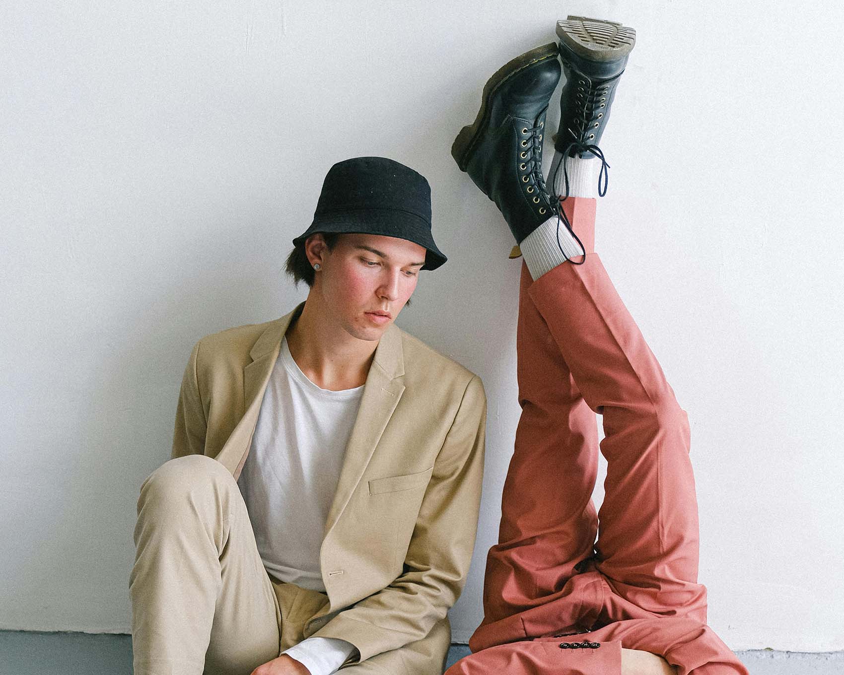 two men laying on floor